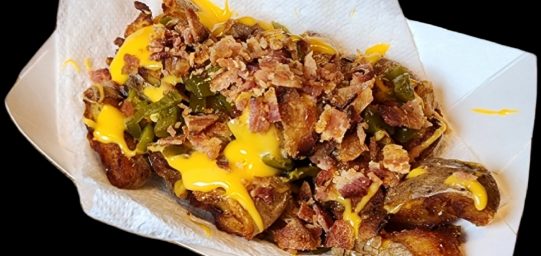 Something with a little spice. Loaded Smashed Tatters with melted cheddar cheese , jalapeños and you guessed it- hickory smoked bacon! Because bacon makes everything better