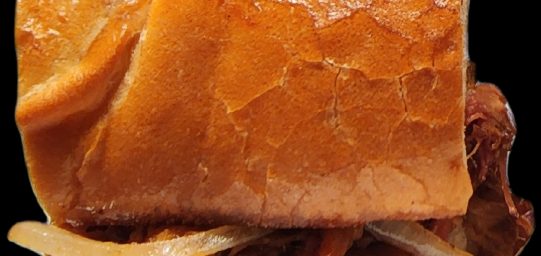 Pulled pork grilled to perfection in our own signature South Carolina smoked chillie mustard sauce. Sweet and spicy. Heaped on top of grilled French bread , grilled onions and our own southern style sweet vinegar slaw.